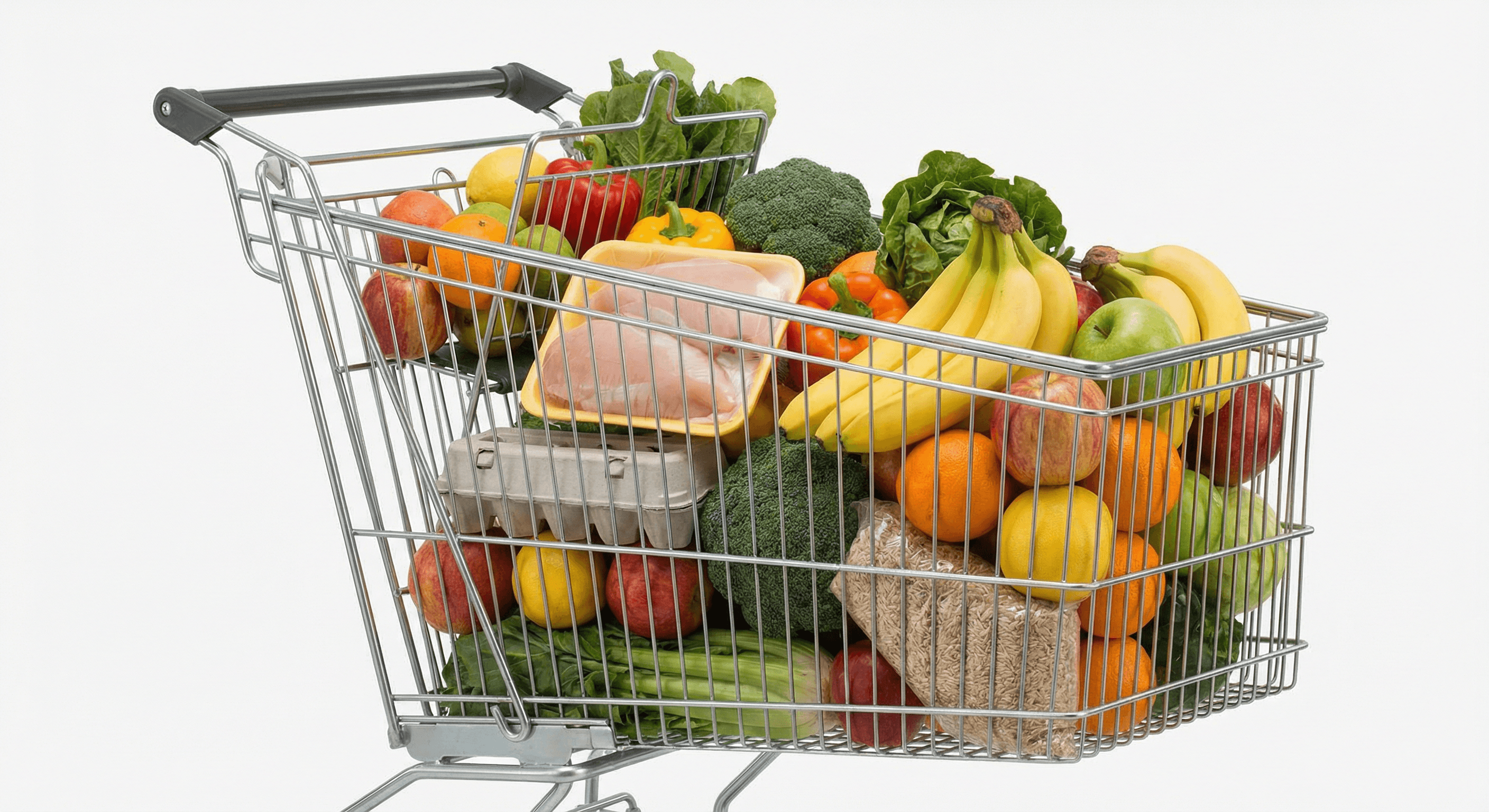 A grocery cart filled with athlete-friendly staples like fruit, vegetables, eggs, rice, and lean protein.