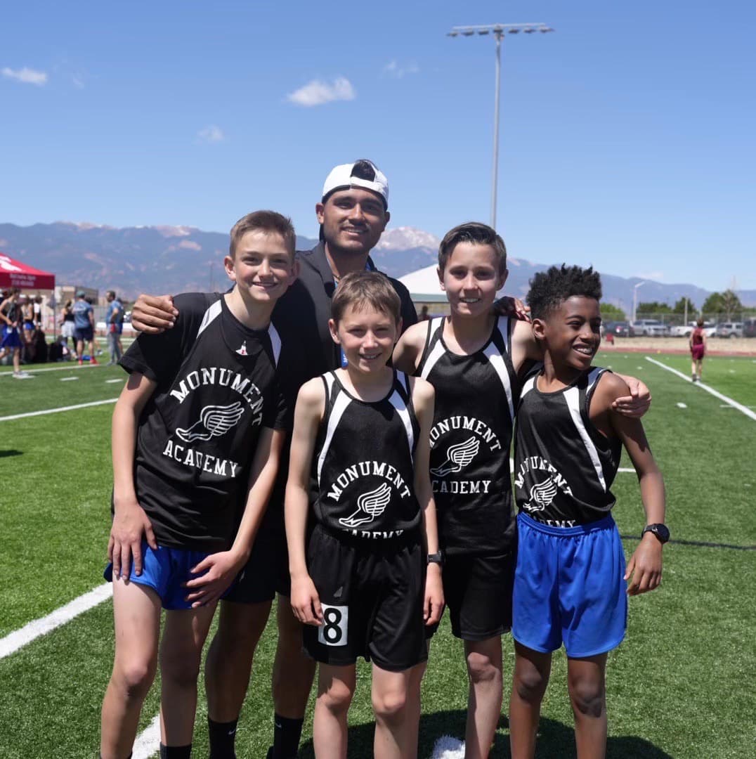 Distance runners training together during a team practice