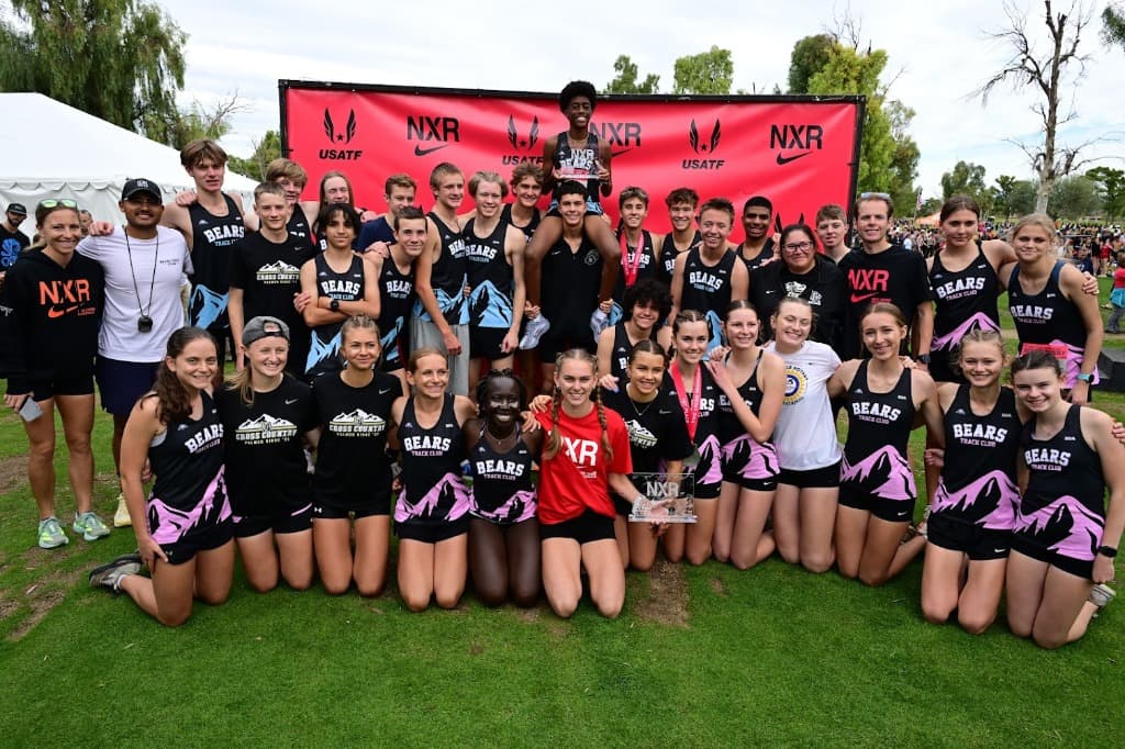 The Palmer Ridge Bears cross country team with their Nike Cross Regionals trophies