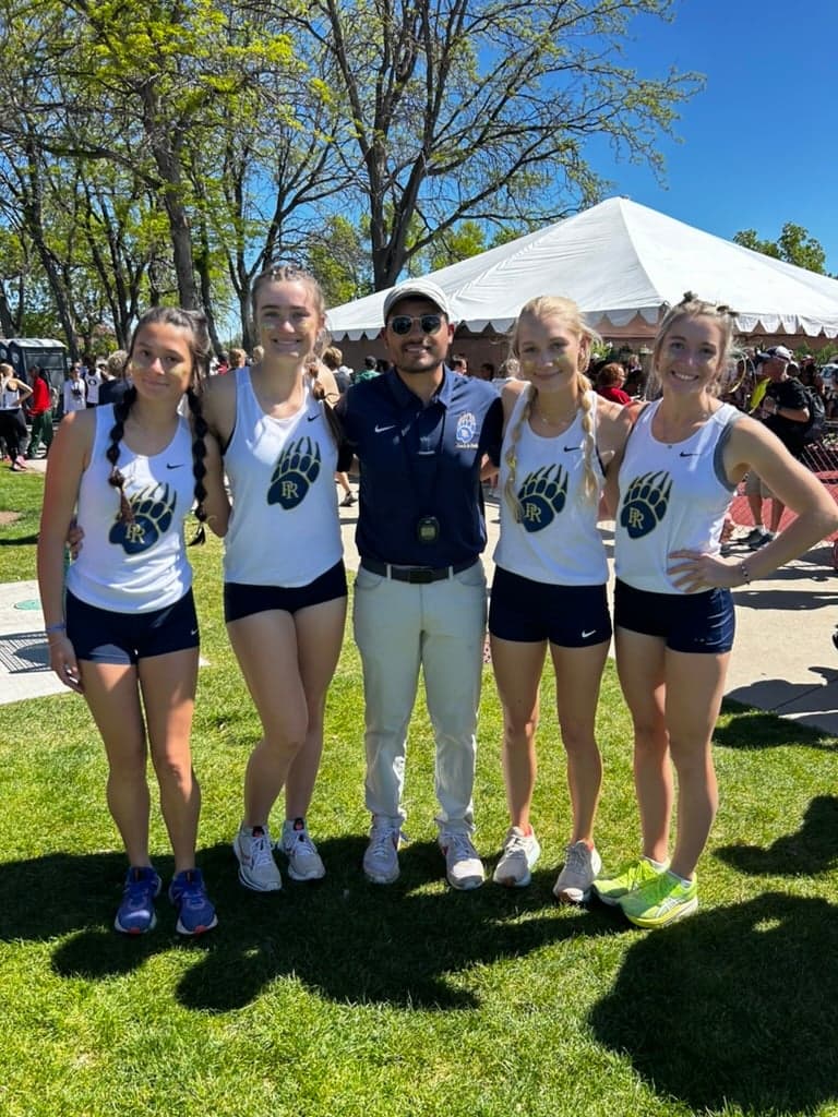 High school runner competing